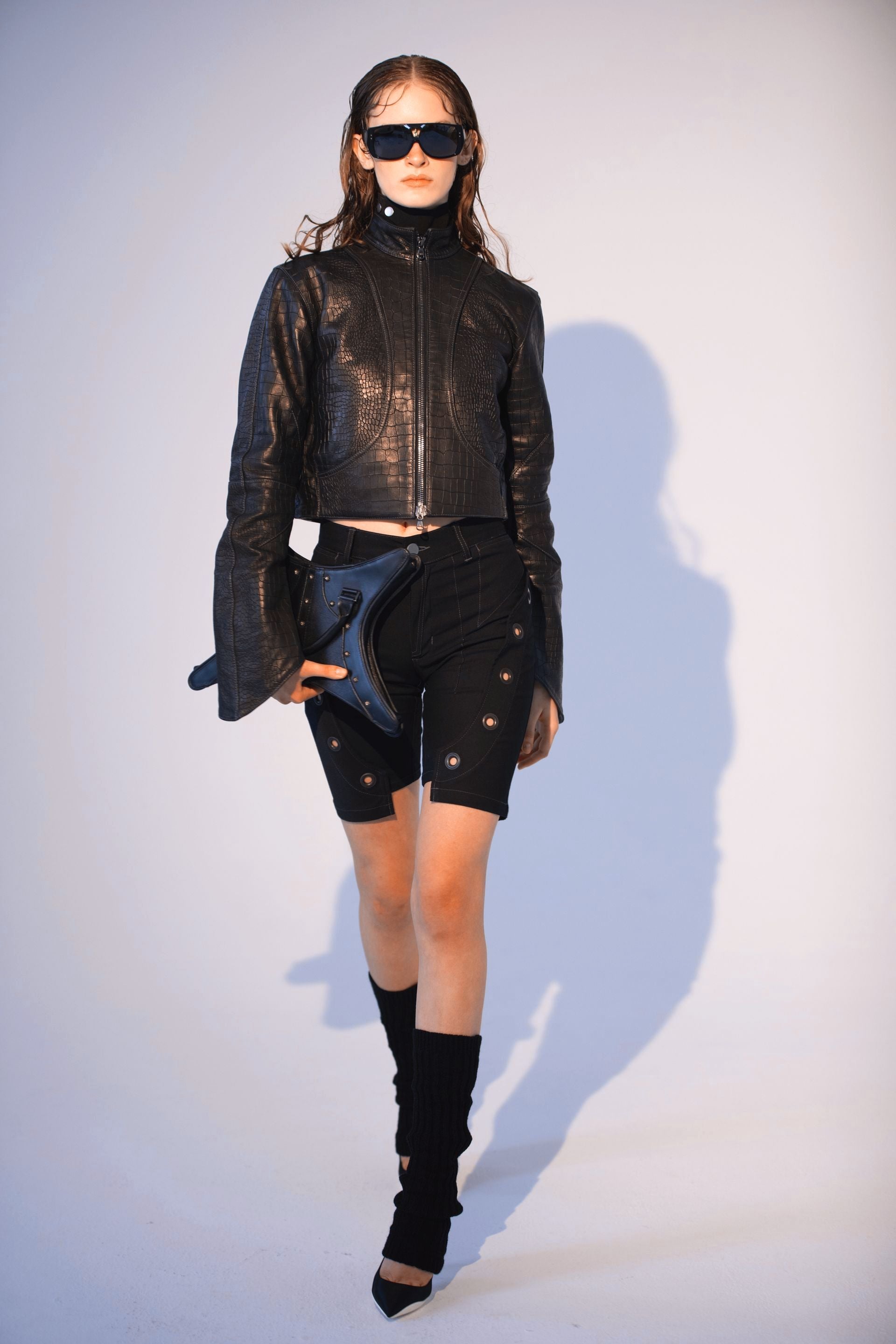Eva Juliet wearing the Orca jacket and Diablo shorts